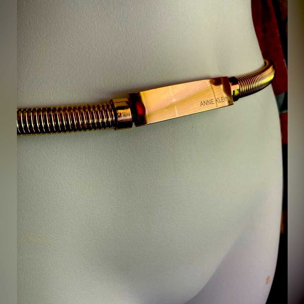 Heavy weight Anne Klein gold colored stretch metal belt